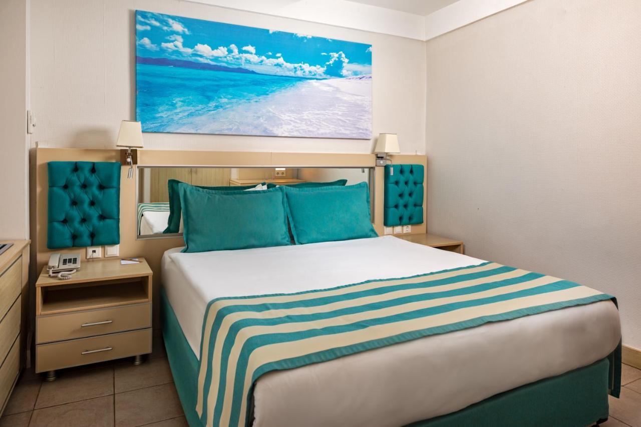 Hotel Aqi Hydros Club à Kemer Extérieur photo A bedroom at the Iberostar Grand Hotel Bávaro